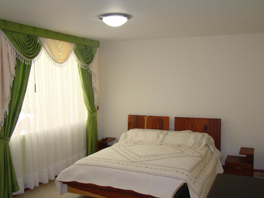 Apartahotel Vincent Suites Pasto Chambre photo